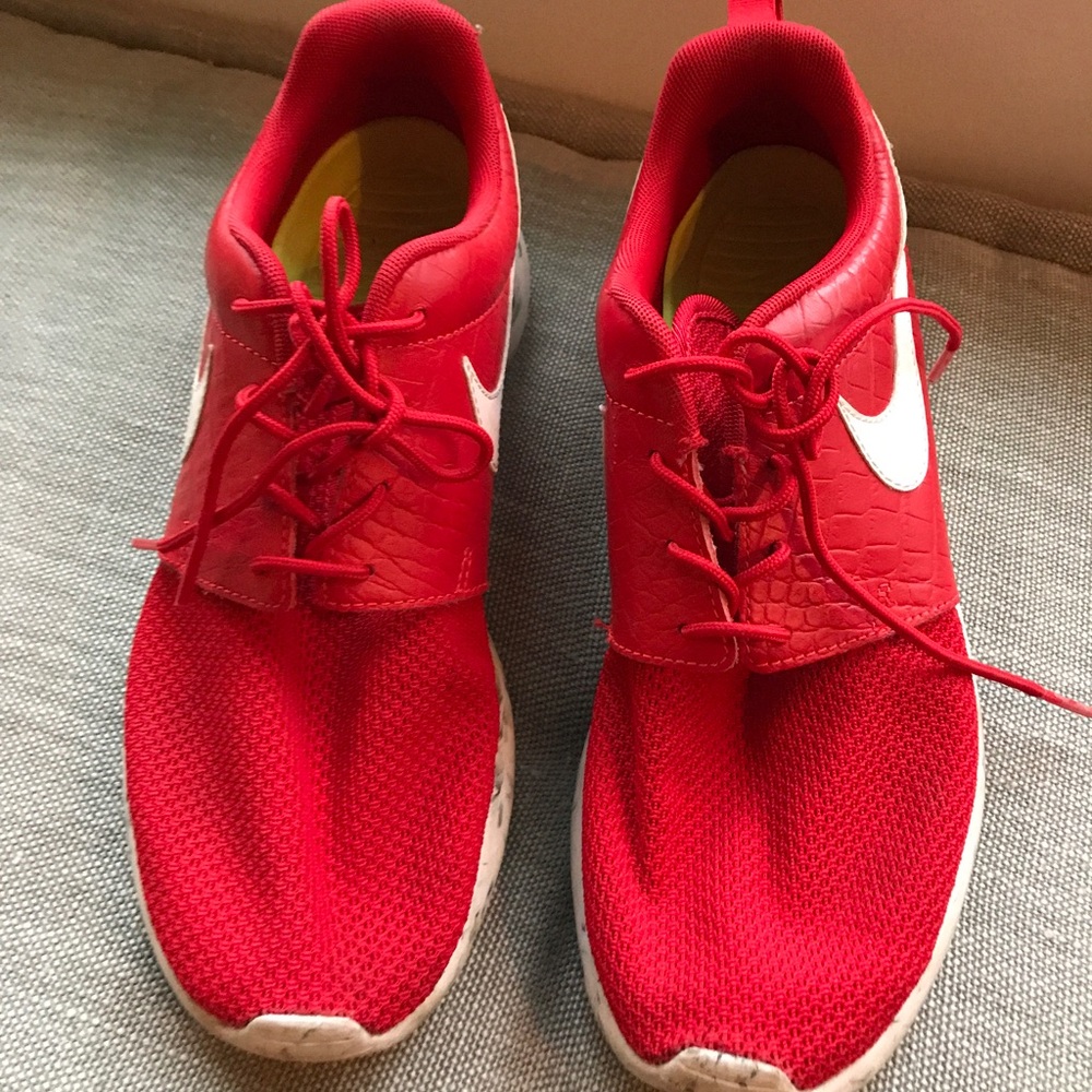 Red Nike sneakers. Worn only a couple times